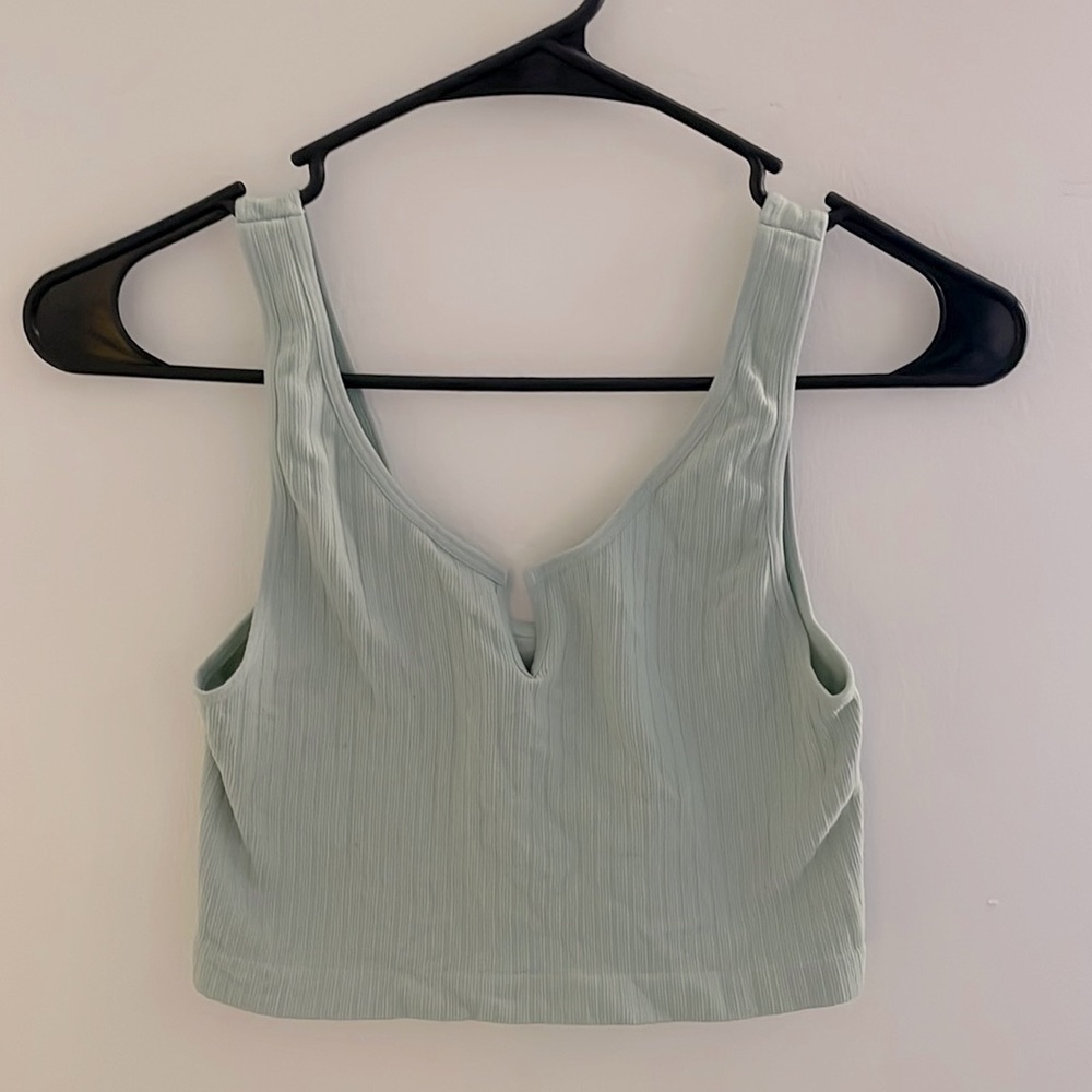Teal tank top. Great condition- in desperate need of an iron